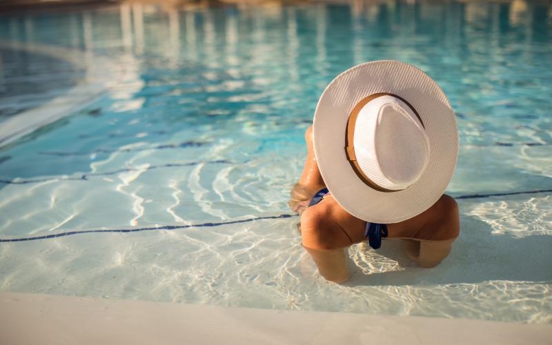 a person laying in a pool