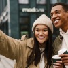 a couple together outside smiling