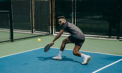 a person playing pickleball